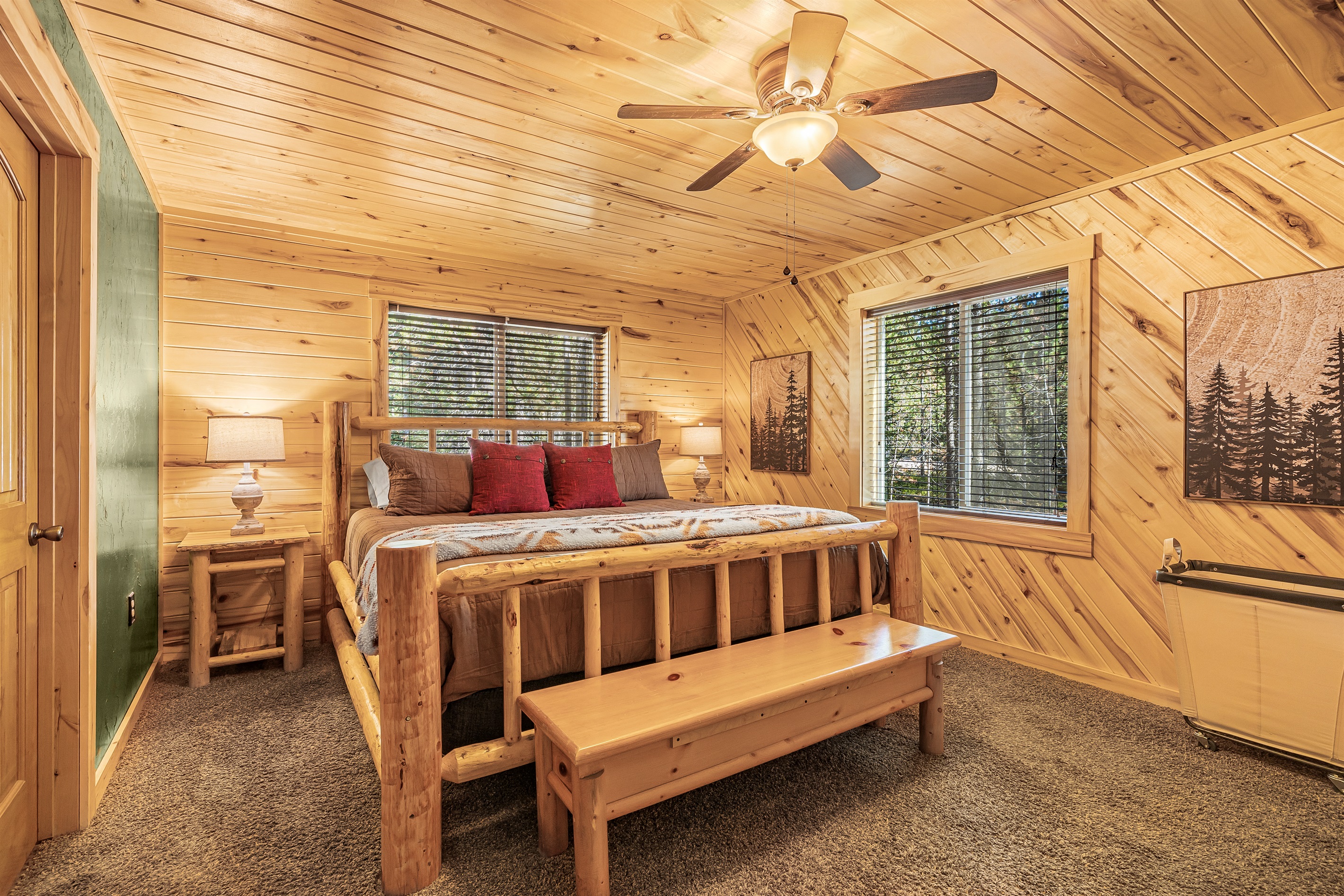 Master bedroom w/ king sized bed and private ensuite bathroom