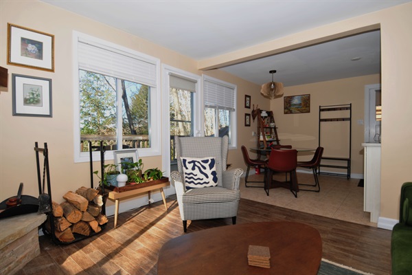 View from living room showing door to balcony and dining area
