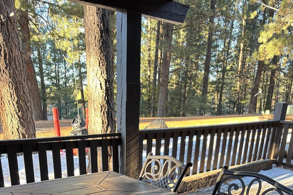 Outdoor dining table on deck