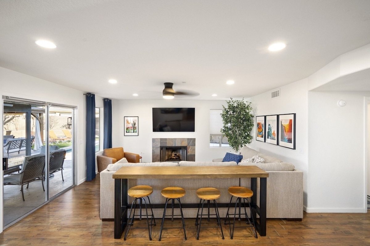 Living room with artwork of some of Arizona incredible landmarks.