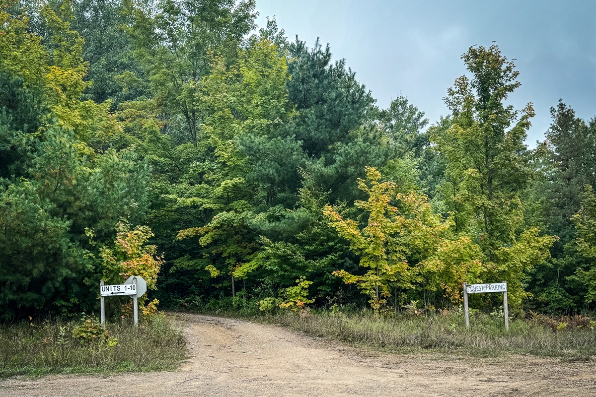 Entrance to the private drive up to the back entrance of the home. Requires 4wheel drive during extreme weather