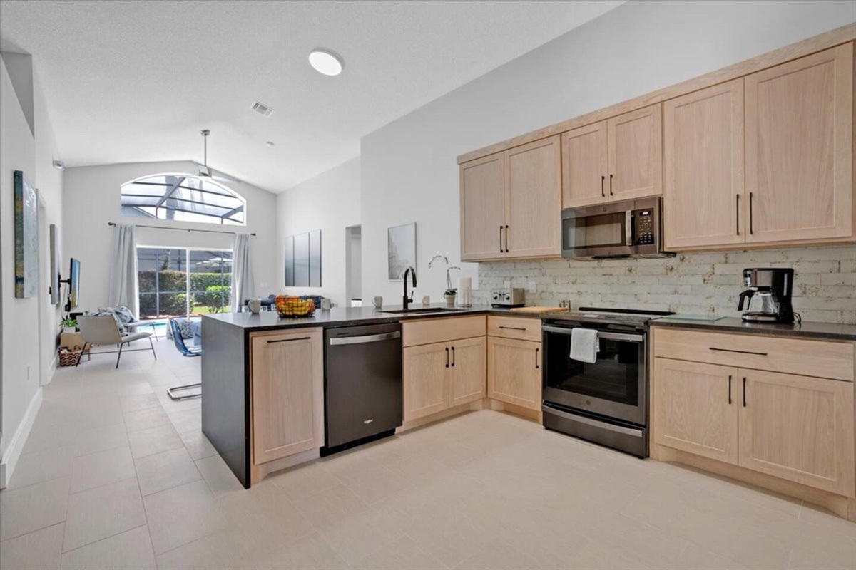 The open floorplan integrates the living and dining area for you to enjoy family time during your stay