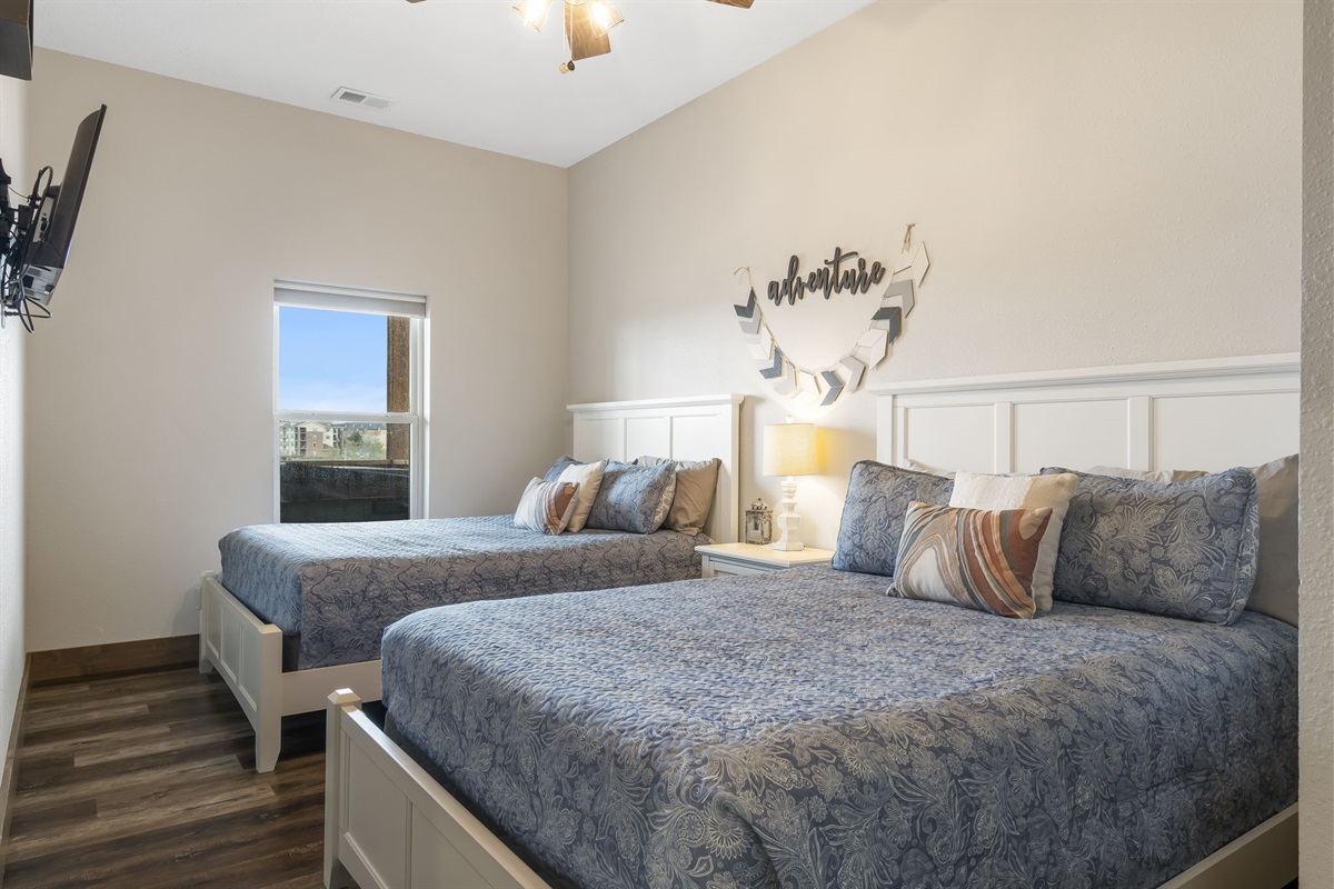 Lower level, double Queen bedroom with amazing views and TV.