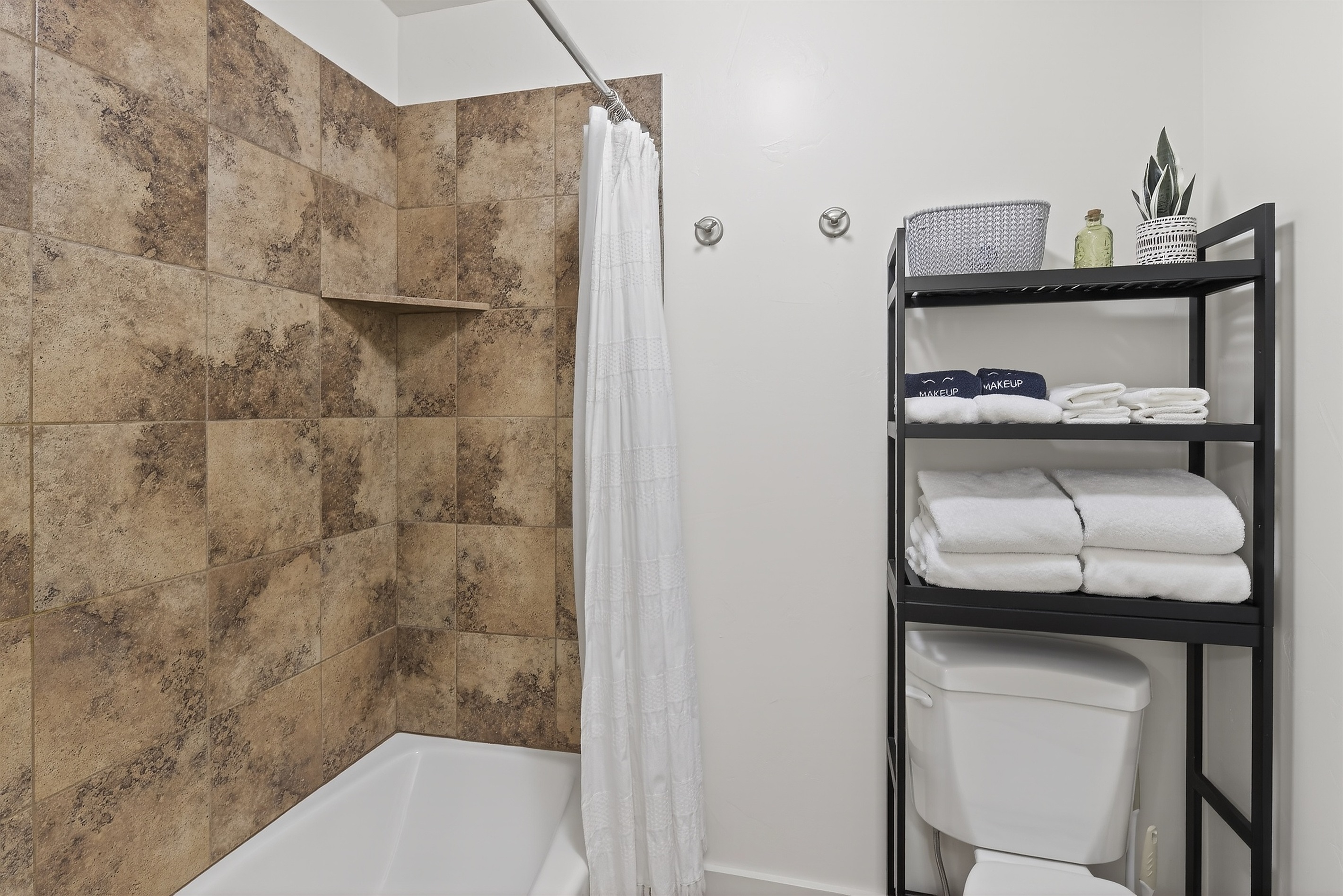 Upstairs Shared Bathroom with separate shower and toilet area