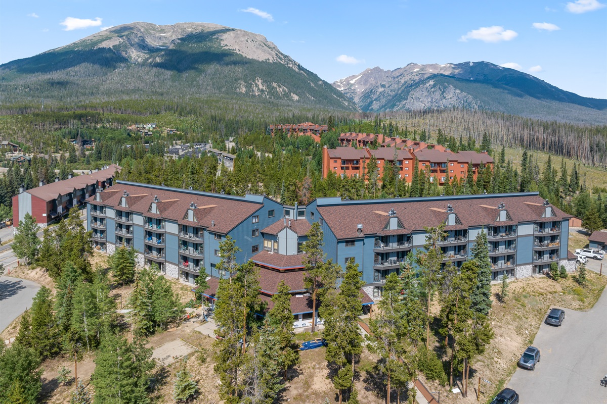 Aerial view of complex and nearby wilderness area
