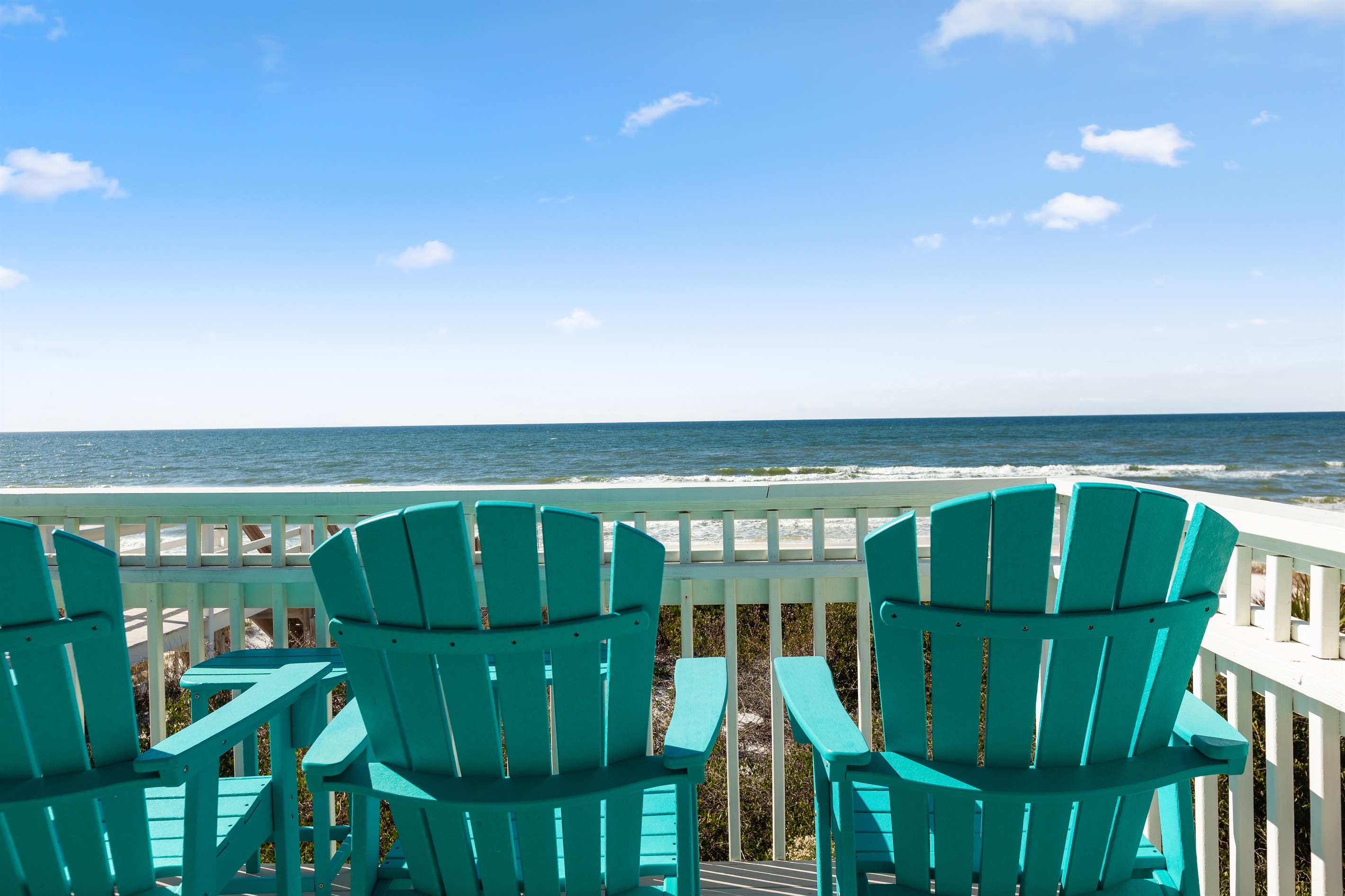 The balcony is always waiting for you - the perfect spot to enjoy your morning coffee, watch dolphins, or unwind as the waves roll in