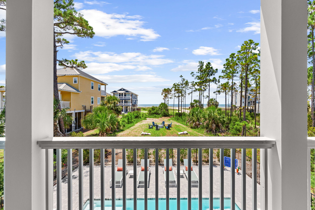 Enjoy peaceful views from the King bedrooms overlooking the beach, pool, backyard, and natural beauty that surrounds this Forgotten Coast retreat.