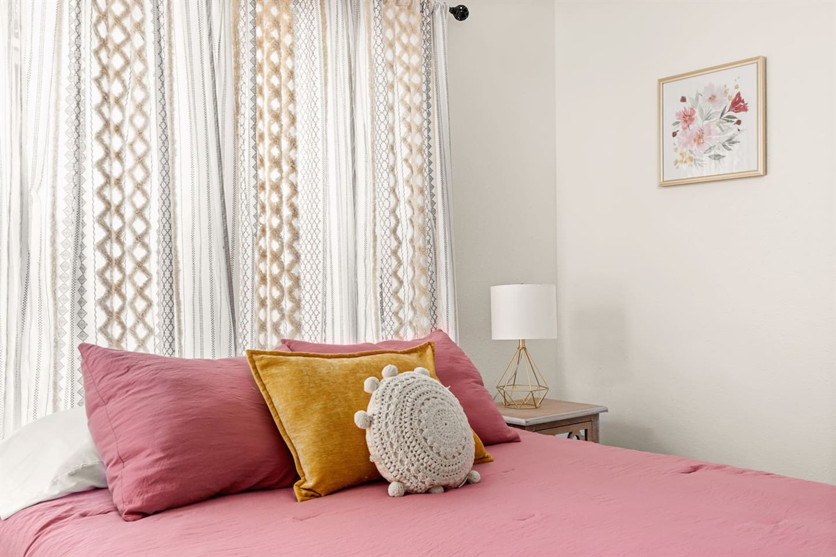 Our first bedroom has a luxurious queen memory foam mattress.