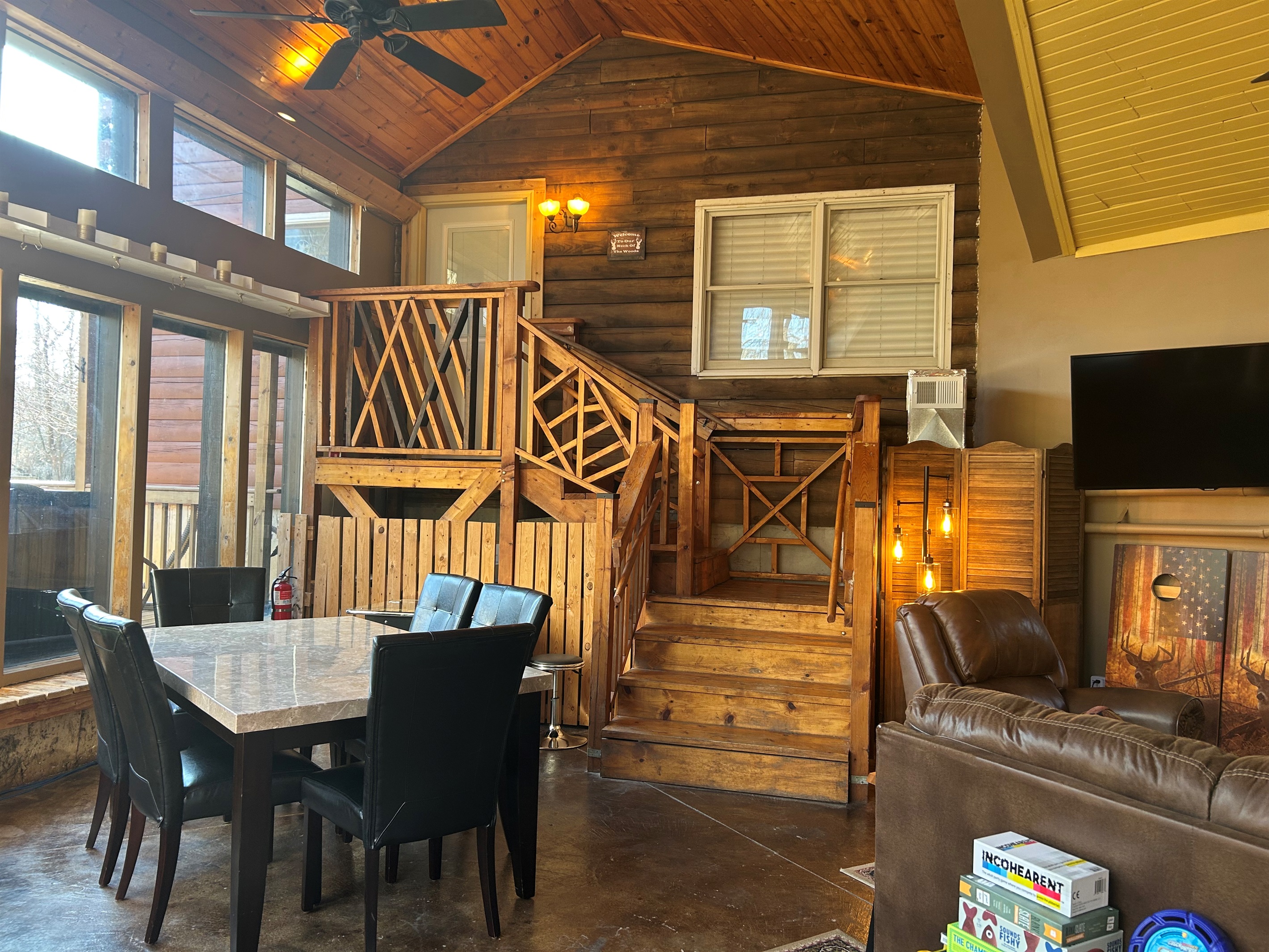 Shared Space: This climate controlled area is a nice shared gathering place between the Log Cabin and Guest Quarters. The entrance to the Log Cabin is at the top of the stairs.