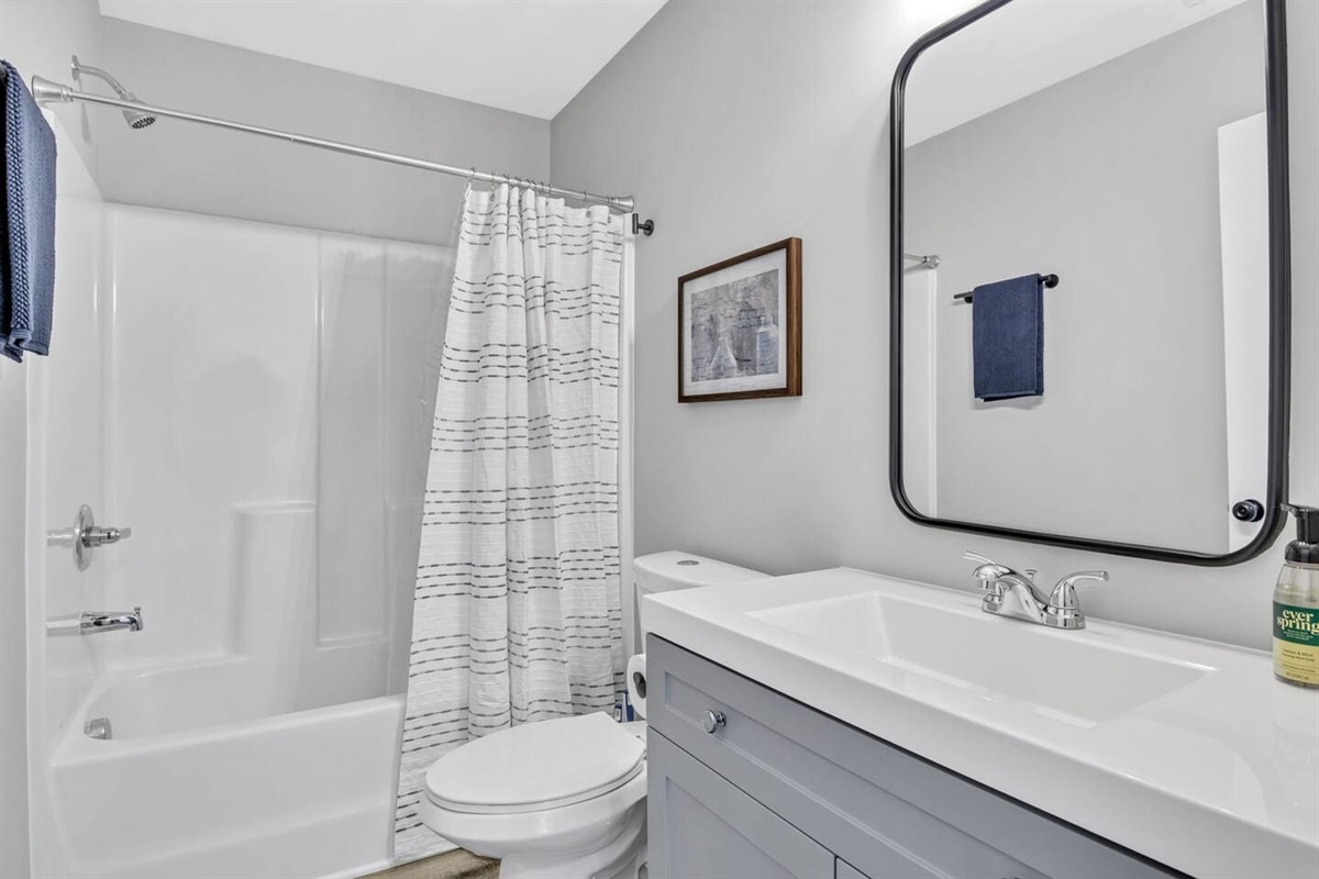 Left side of duplex - Hallway bathroom