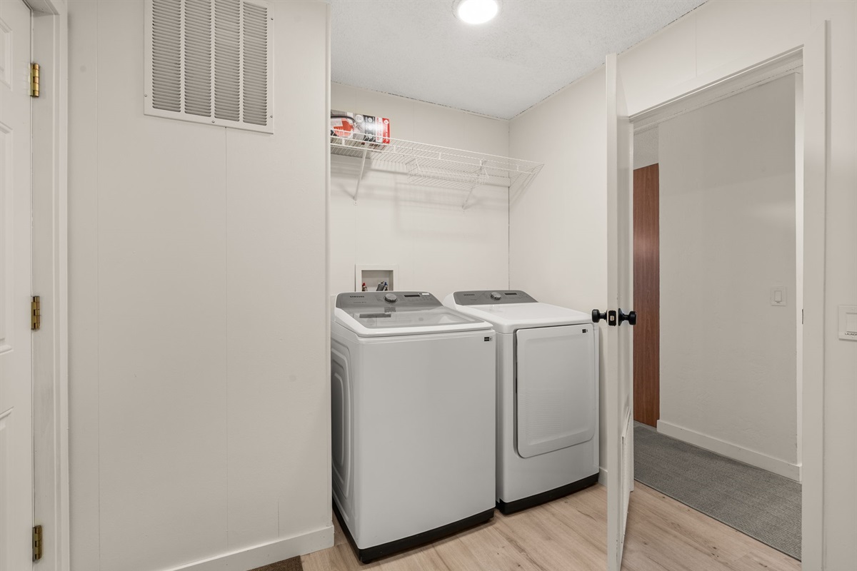 Convenient entry space with a brand-new top-load washer and dryer—everything you need for a comfortable stay