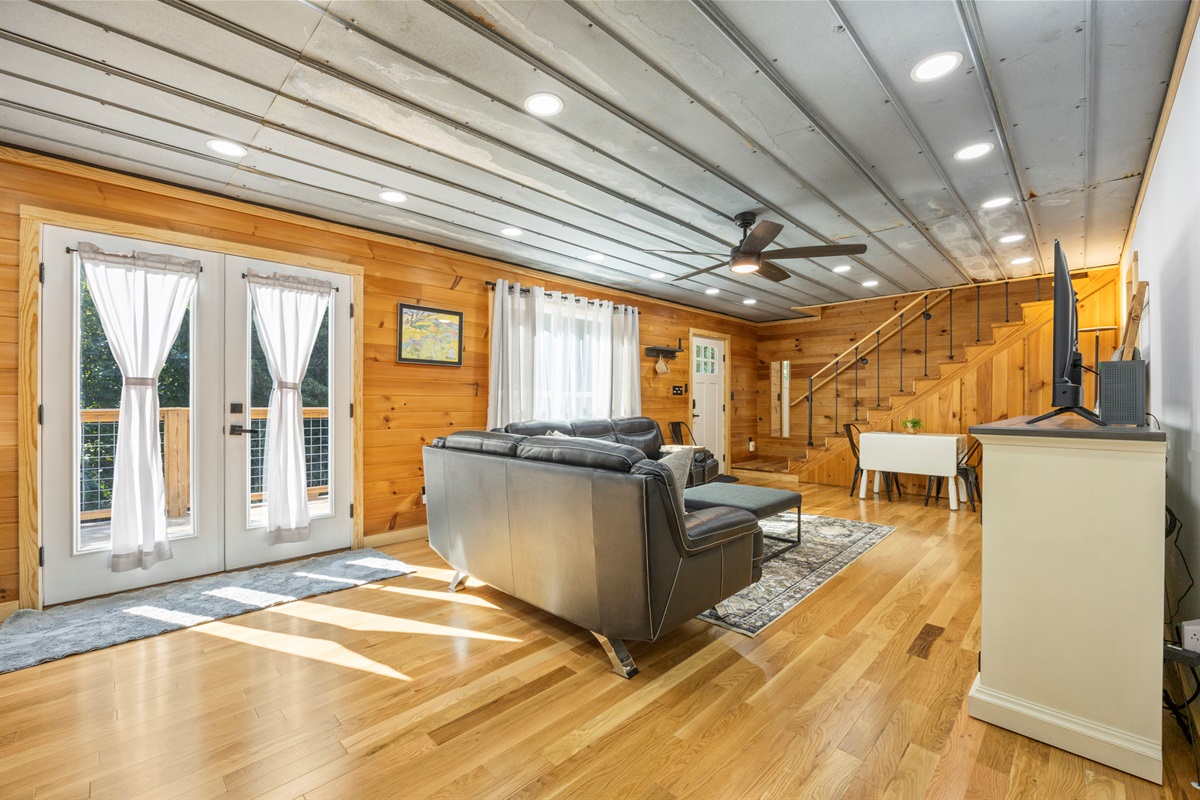 Dining area with seating for six and natural light — perfect for family meals or game nights.