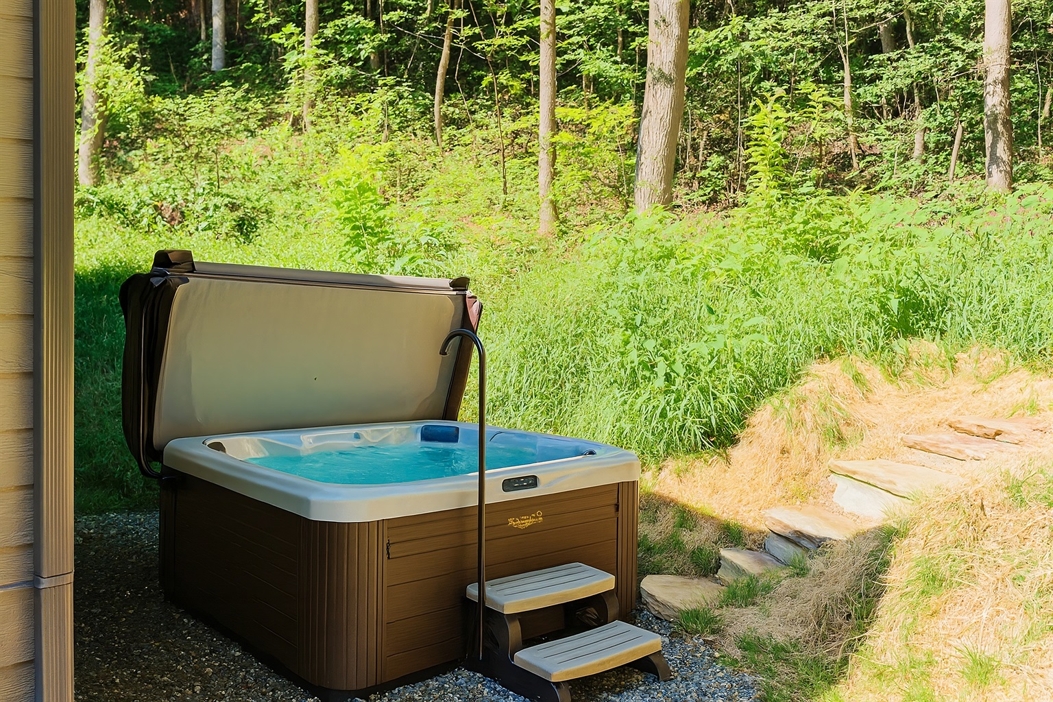 Two person hot tub around back!