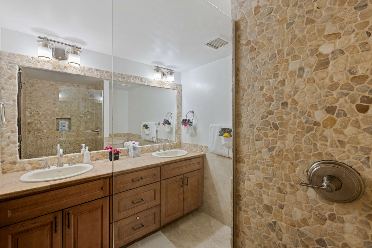 Refresh after a day at the beach in the spacious walk-in shower.