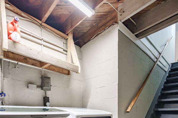 Laundry located in garage | stair access | shared with basement tenant