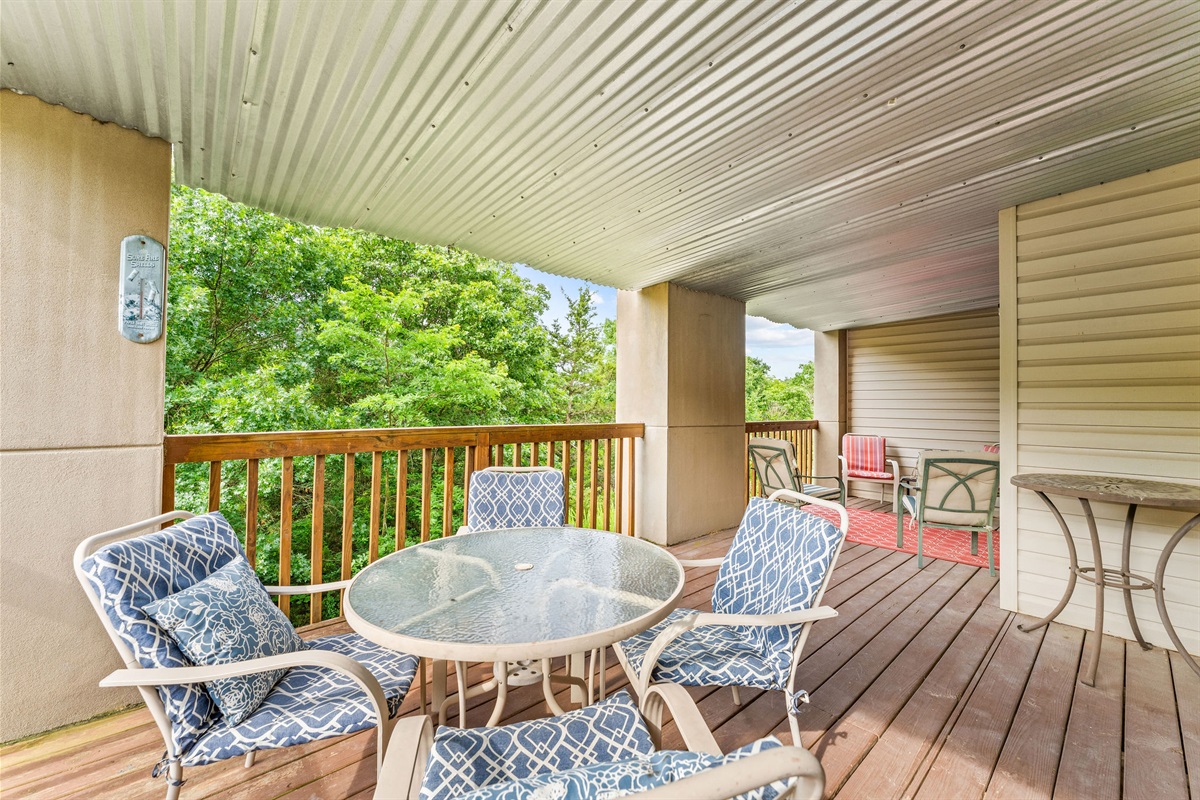 Private 24' deck with outdoor seating—ideal for relaxing, dining, or enjoying the fresh air.