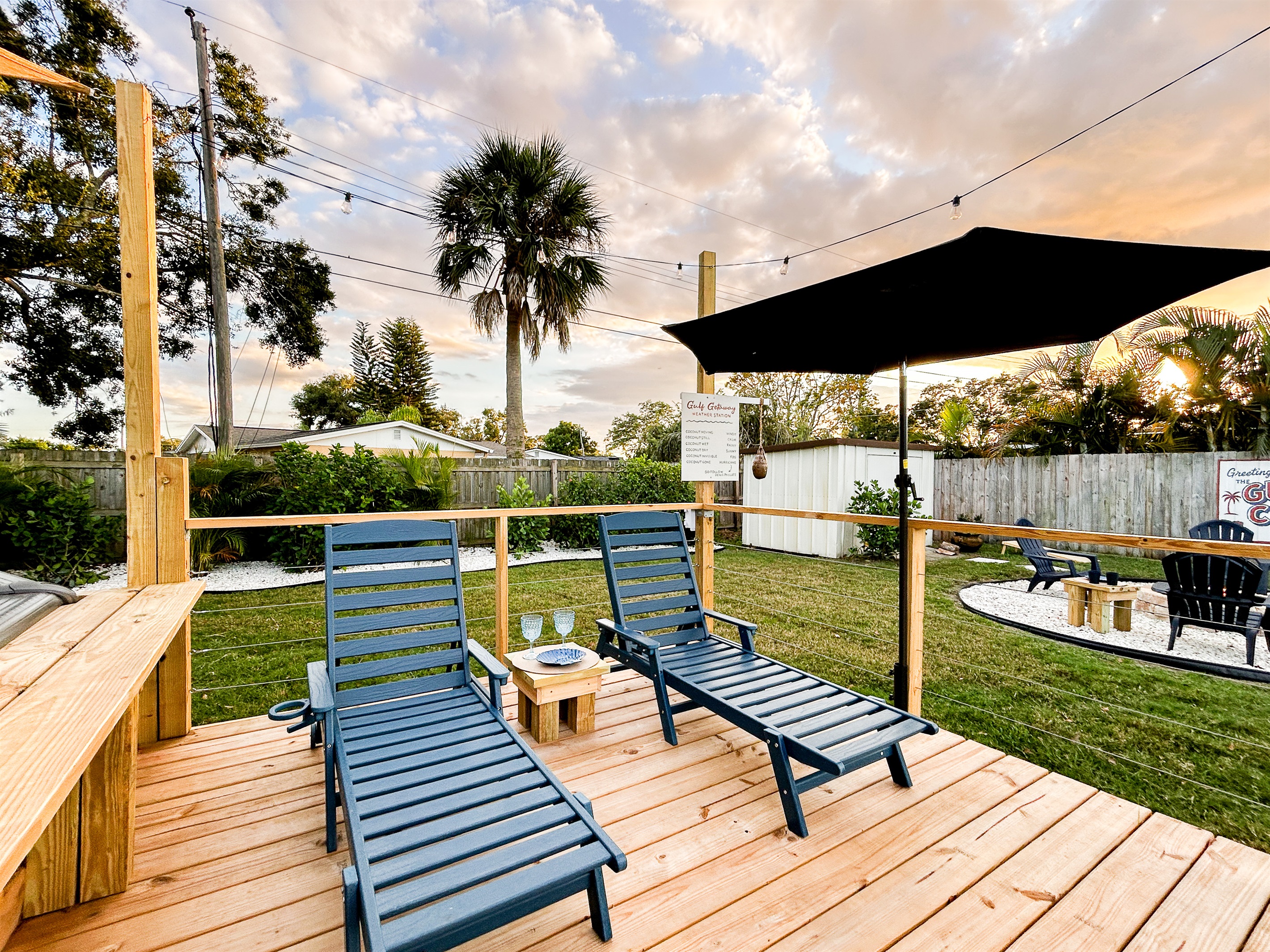 Sun Loungers, Deck, Umbrella, Patio Lights, Fire Pit & Coconut Weather Station 