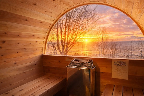 Your private sunrise sauna sanctuary. Step into the barrel sauna and watch Lake Superior light up the day. Imagine easing sore legs after a long day at Lutsen, settling into this view!