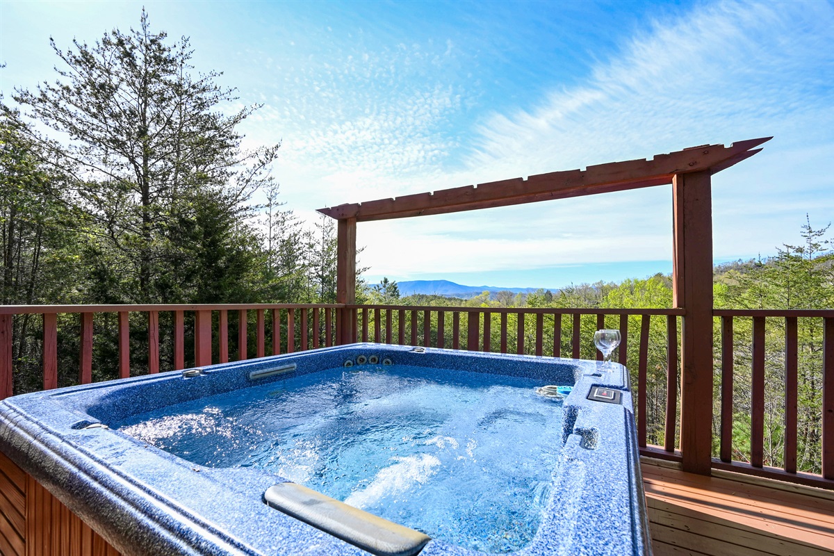 Private hot tub with Smoky Mountain views at night