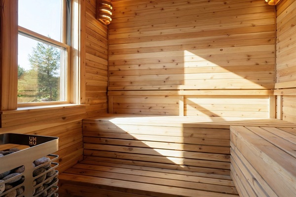 Enjoy a warm, relaxing session in this cedar sauna, perfect after a day of exploring the mountains.