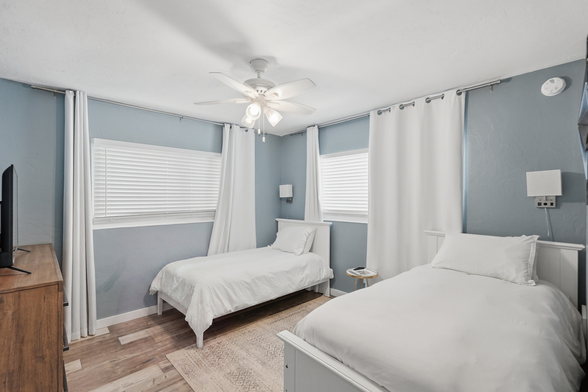 Cozy and inviting, the guest bedroom provides a comfortable space for family or friends to relax and enjoy a restful night's sleep.