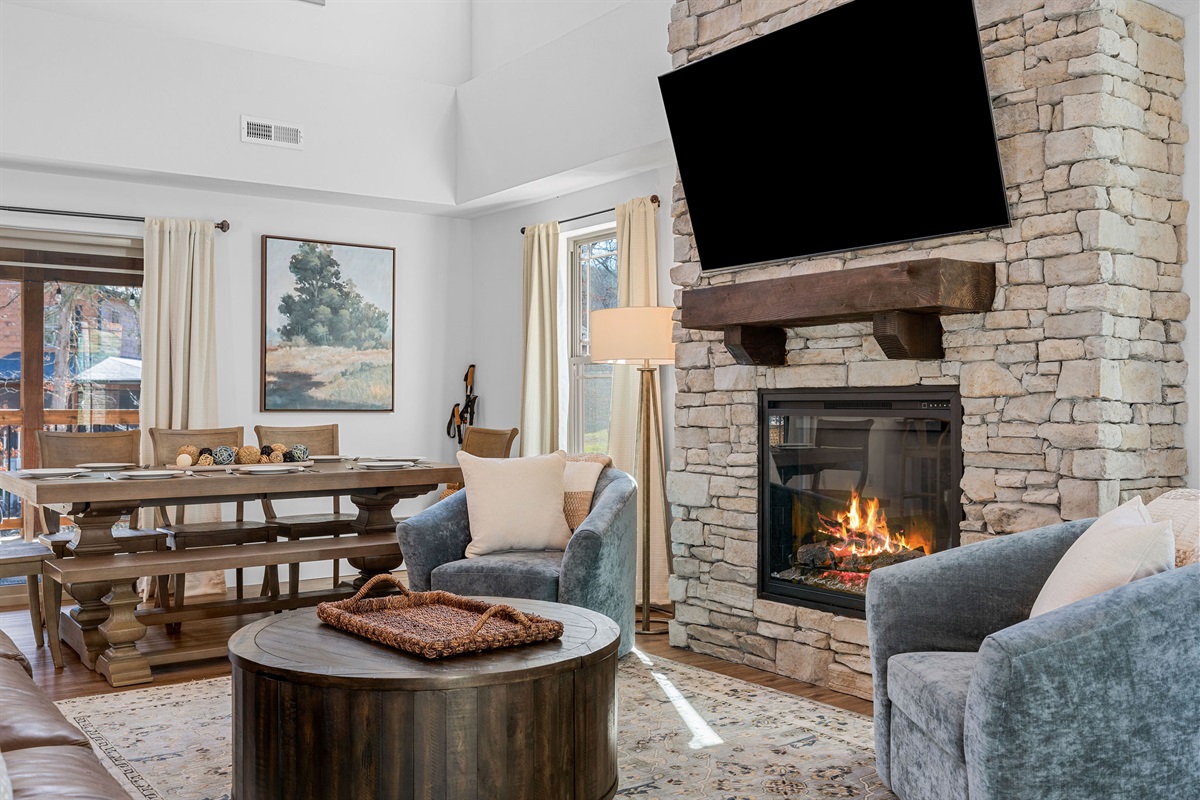 Inviting living room with a fireplace and TV—ideal for cozy nights in.