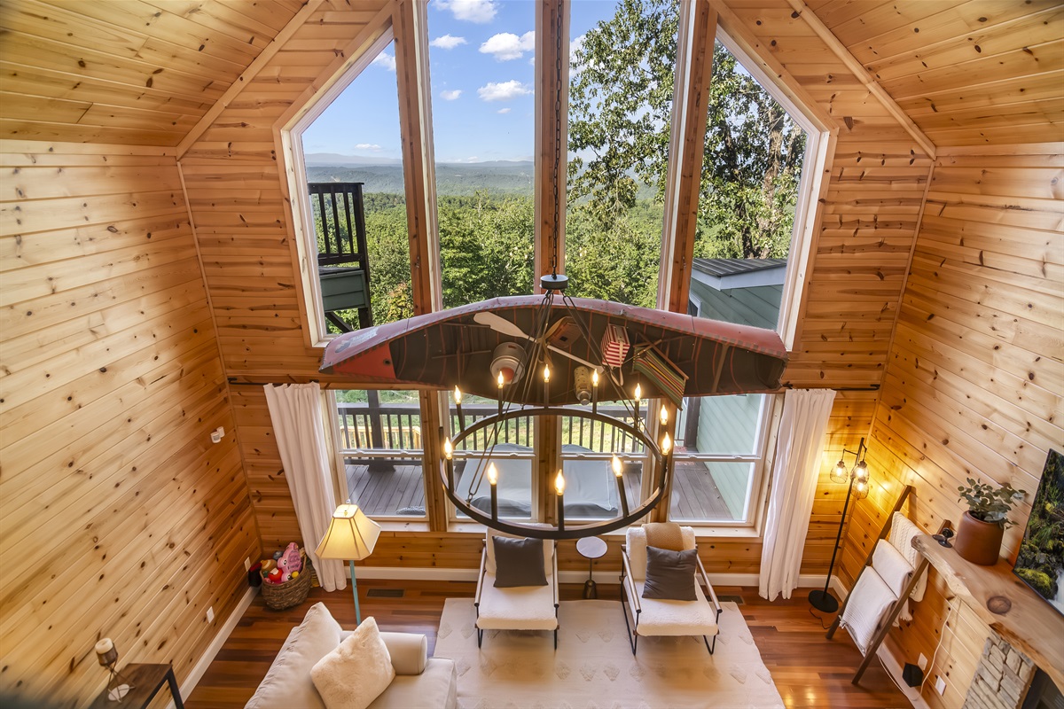Aerial view of living room from upstairs balcony