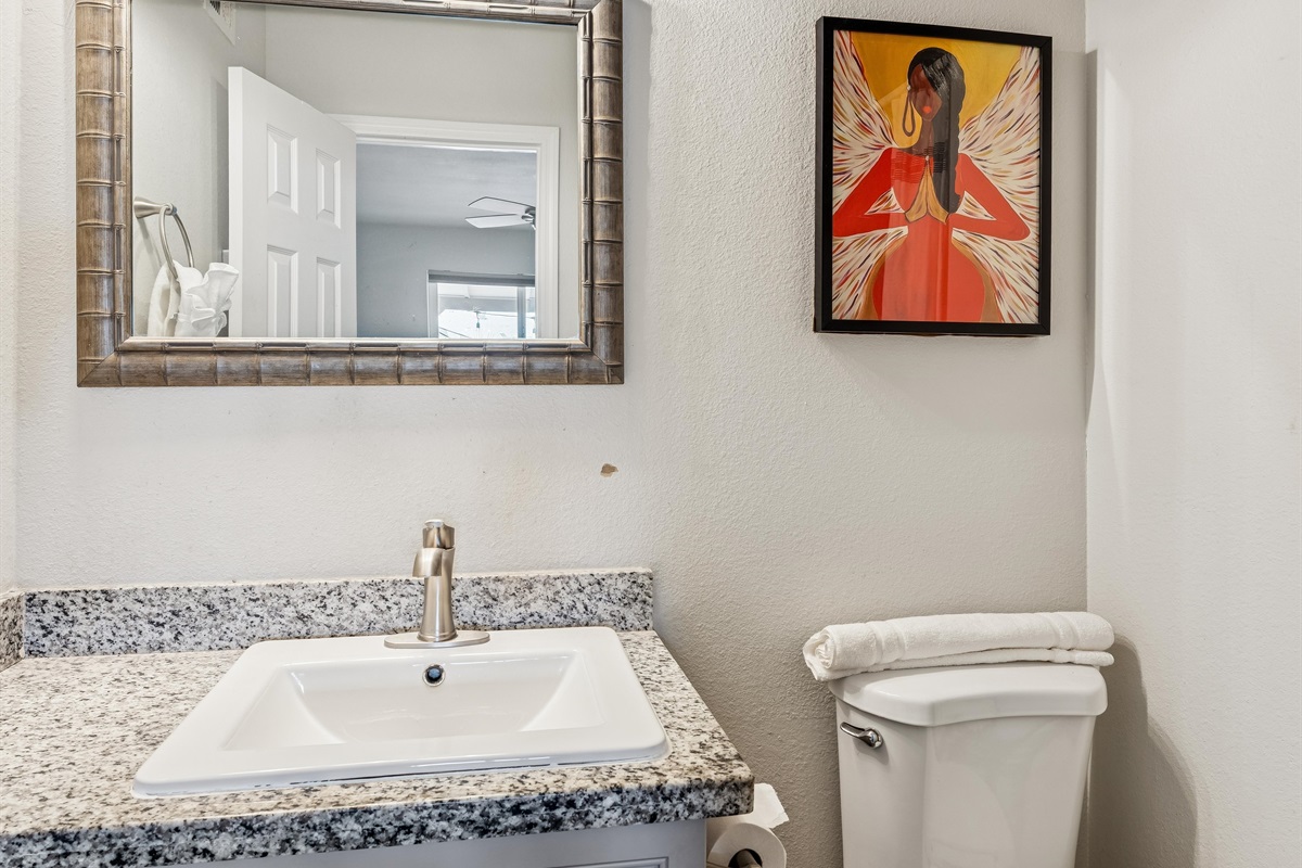 One of two full bathrooms that is brand new with high end details
