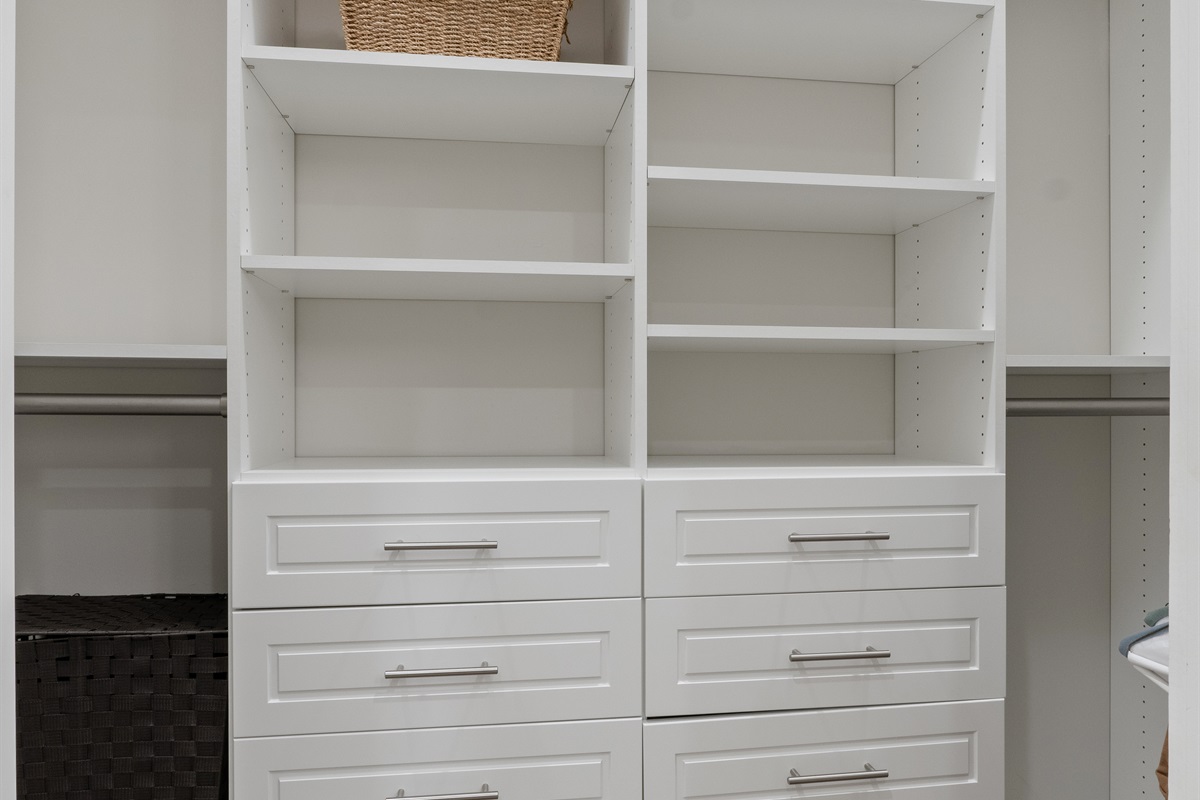 The master suite features a large custom closet, offering plenty of space and organization for extended stays.