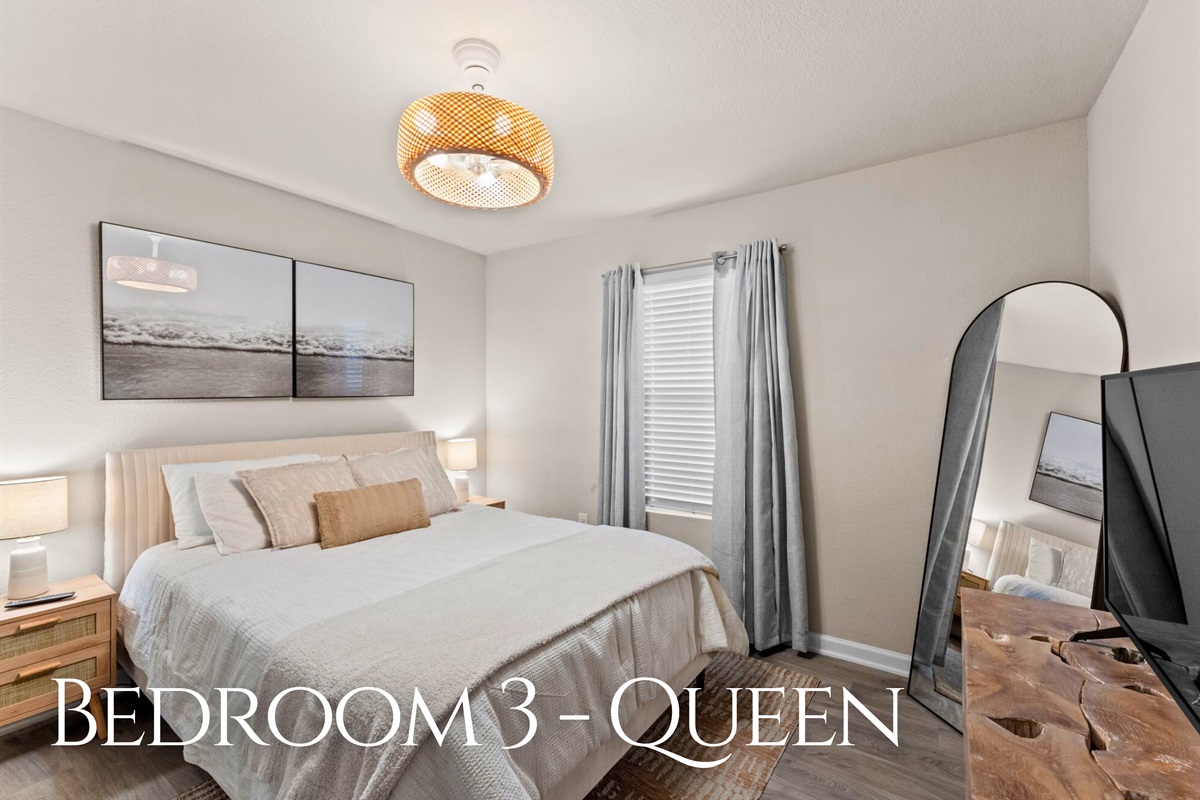 Another Queen bedroom offers a comfortable and bright, airy layout that makes settling in feel easy and effortless.