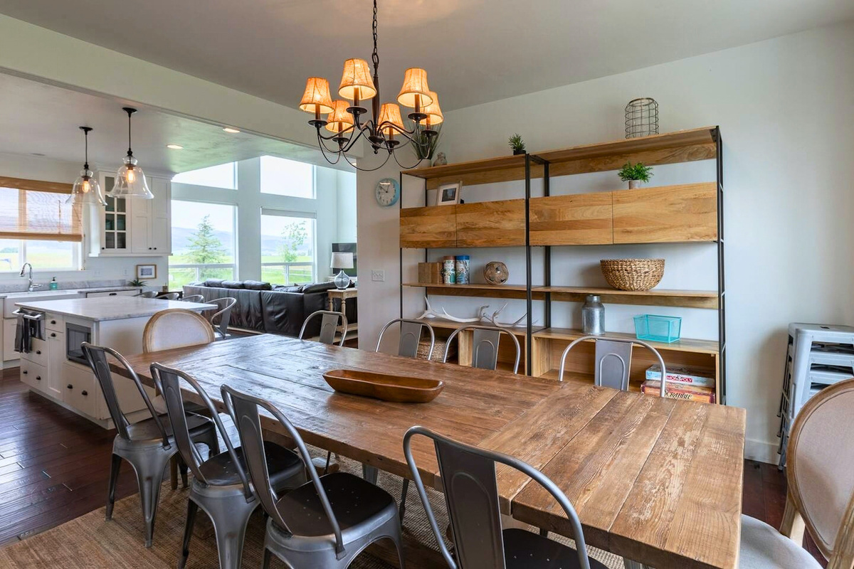 Dining table seats 10 comfortably, with extra stools nearby for added space