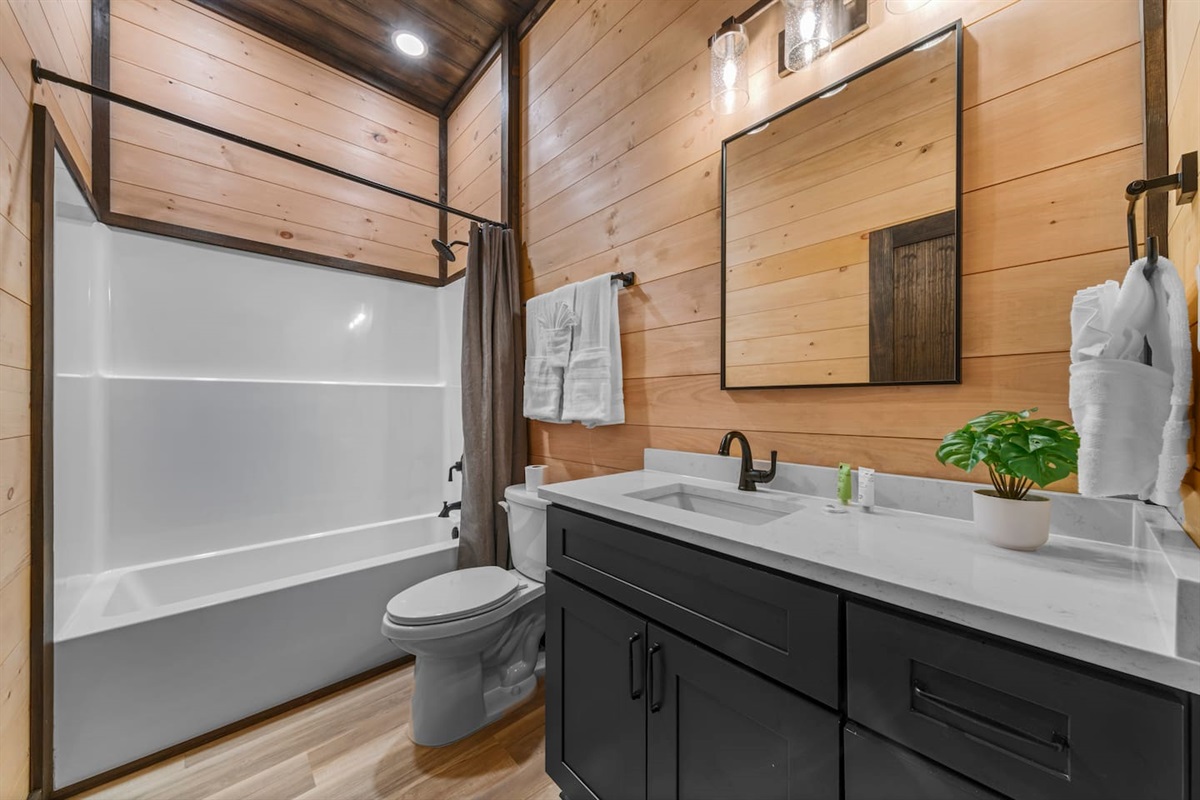 fifth full bathroom is on the lower level