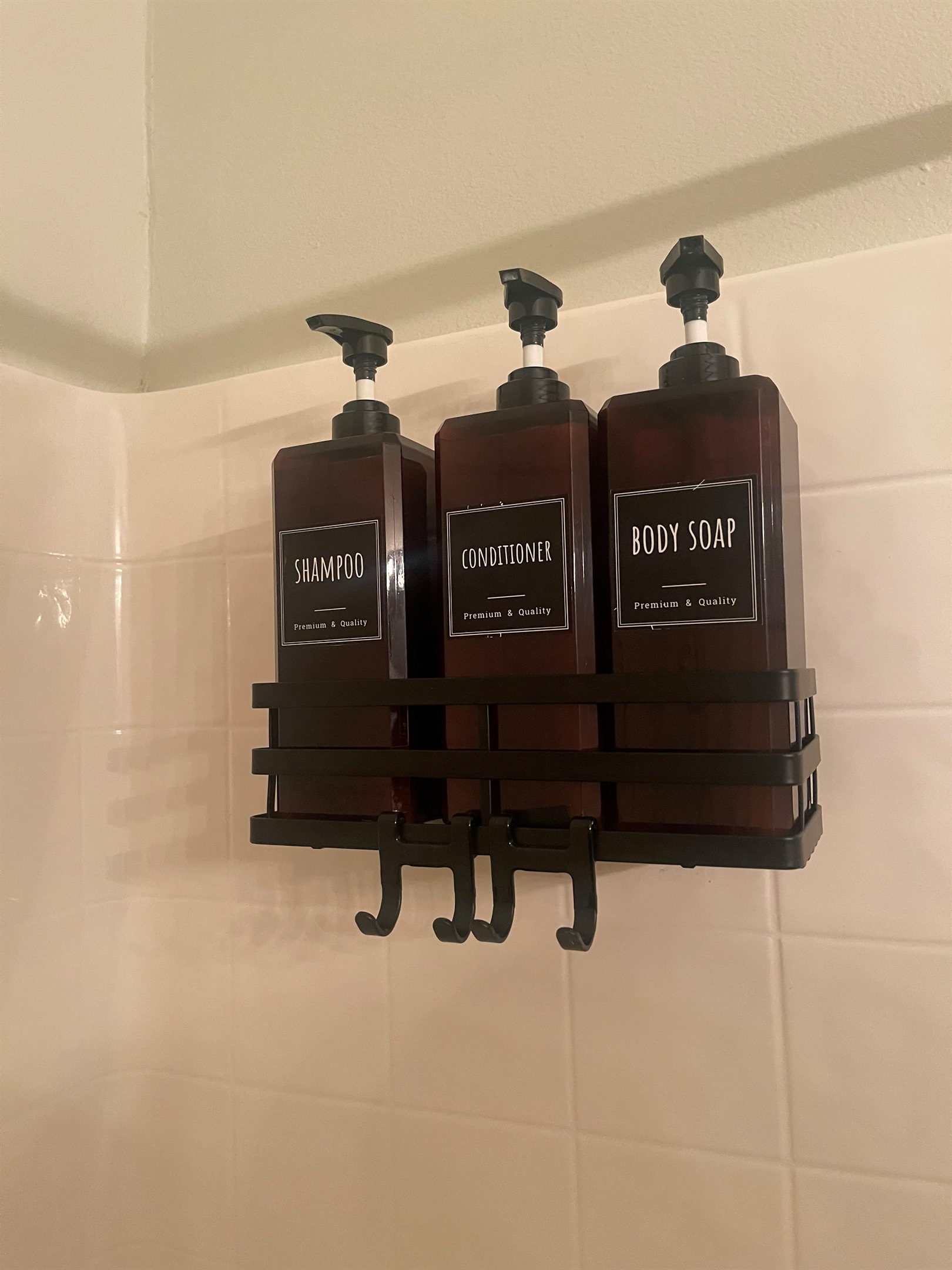 Shower stocked with premium shampoo, conditioner, and body wash for a convenient, hotel-style experience.