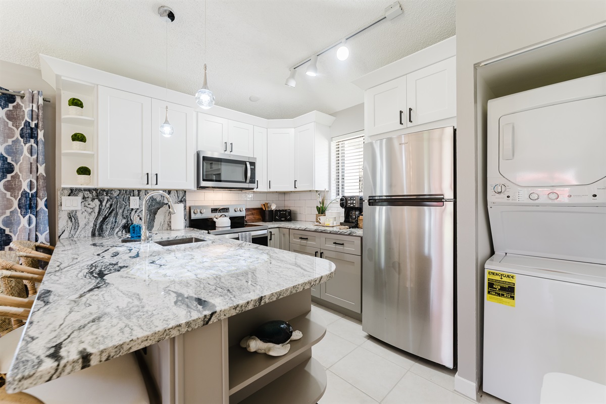 Fully upgraded kitchen with modern finishes, stainless steel appliances, and everything you need for cooking and entertaining at home
