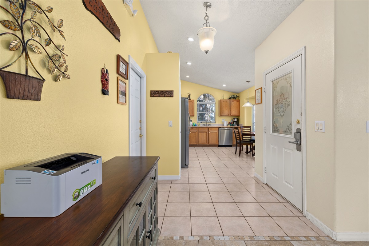 Wireless printer with NFC and USB cable for guests to use.