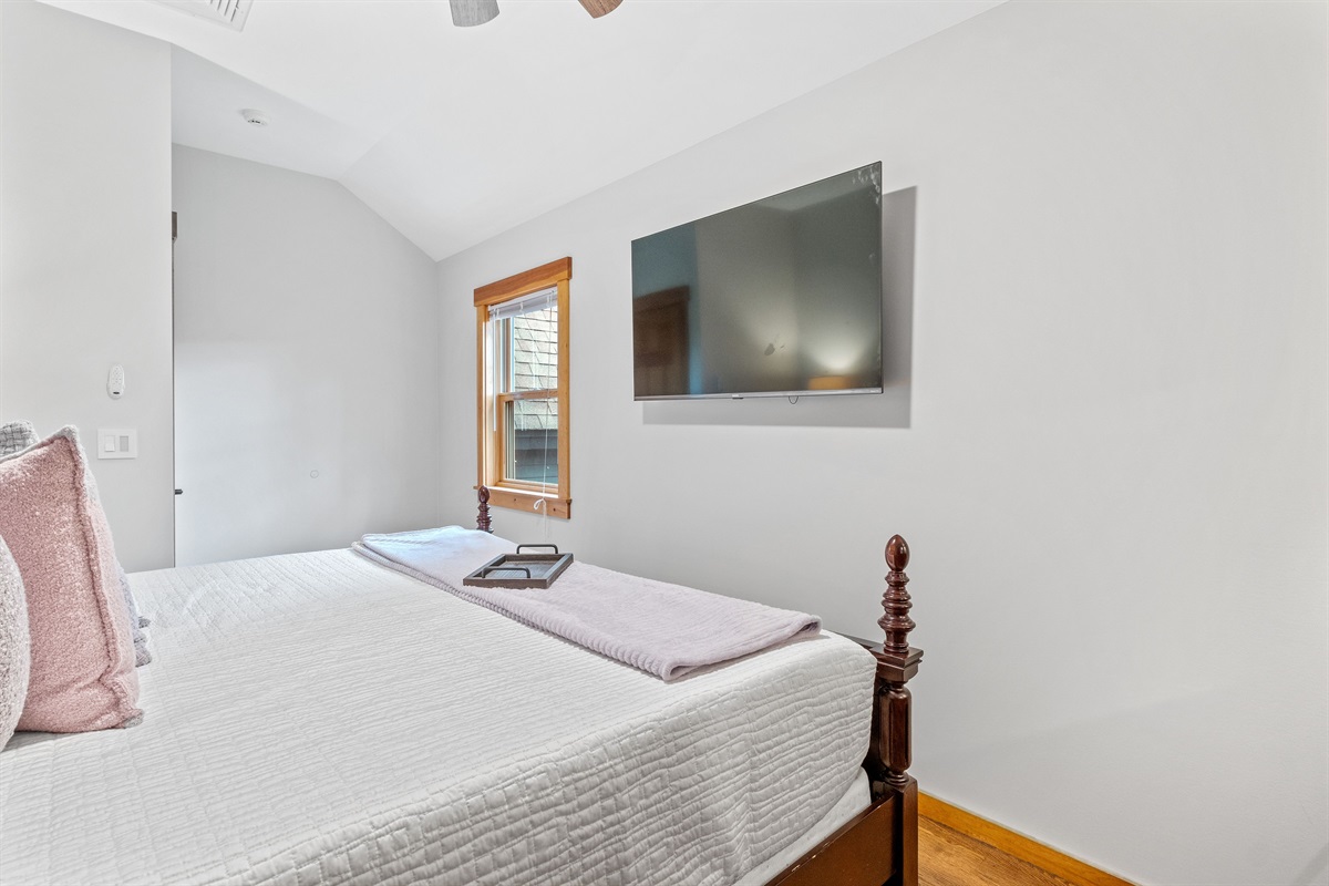 Second floor ensuite bedroom with king bed and its own full bath