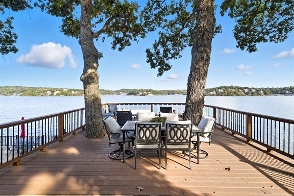 Relax in comfortable outdoor seating with lakefront views