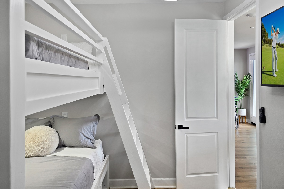 Bedroom #5 has a ceiling fan and smart tv.