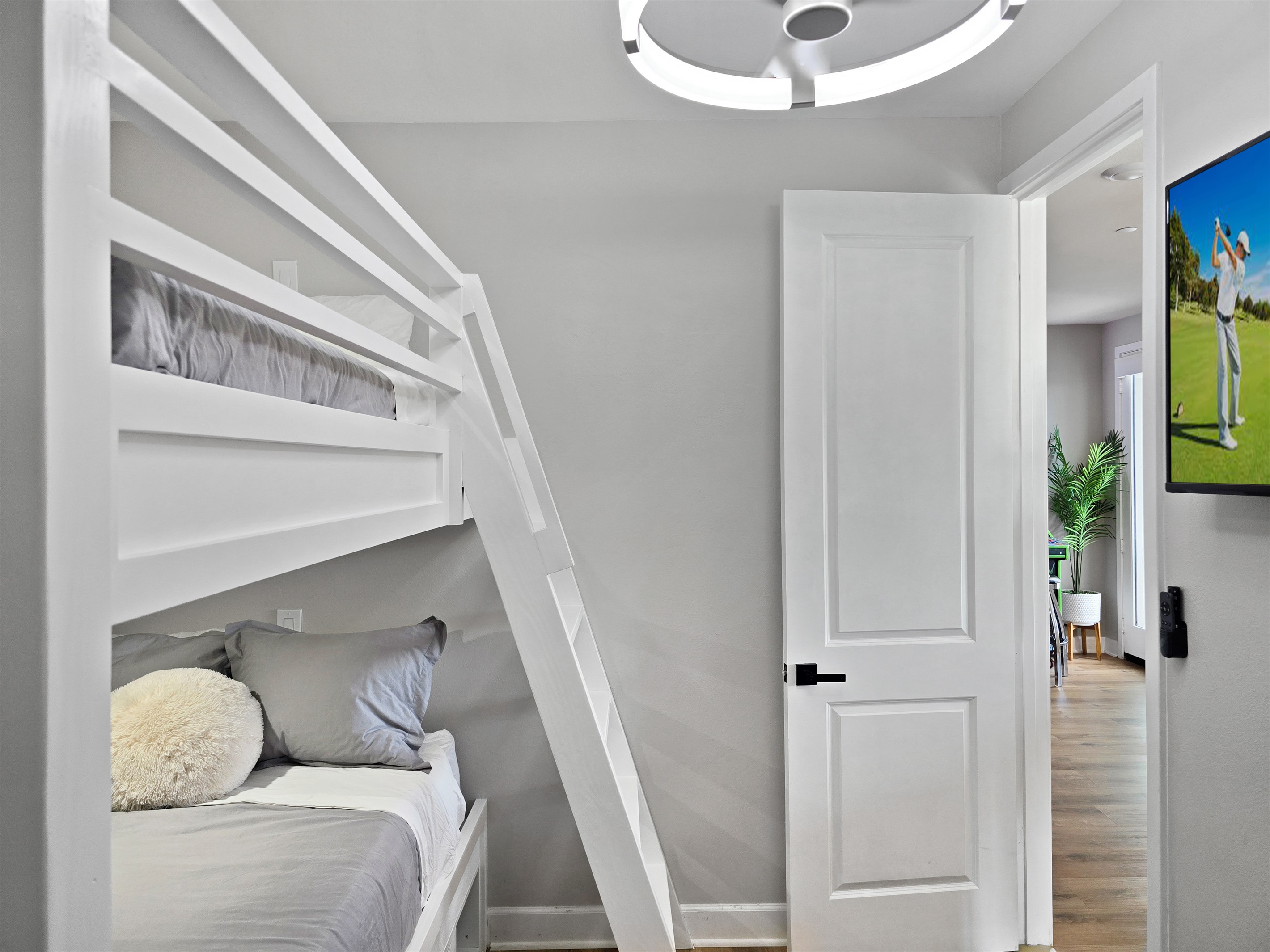 Bedroom #5 has a ceiling fan and smart tv.