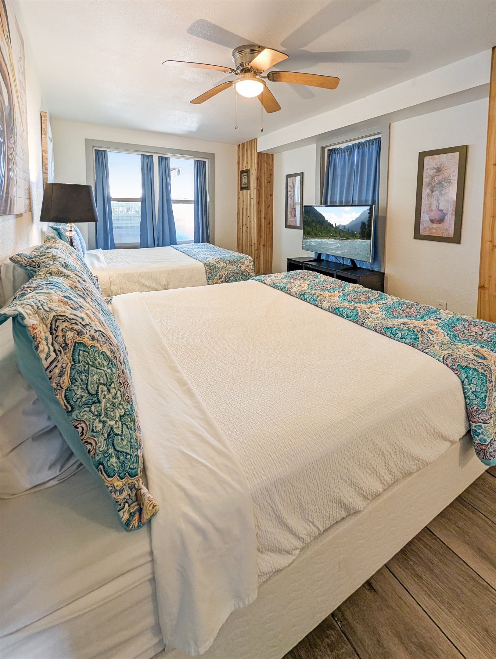 Bedroom #2 has two queens and a smart tv