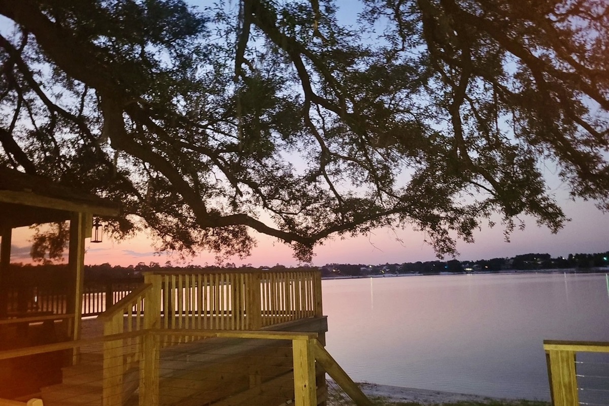 Screened porch deck at night