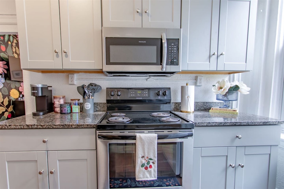 Full kitchen featuring sleek, modern stainless steel appliances for a stylish and functional cooking space.
