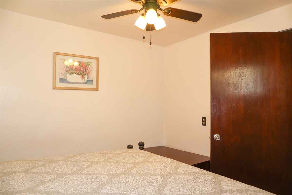 Circa Del Mar - Downstairs Bedroom 6 with a King bed with Wesley Allen headboard and open-toe foot posts.