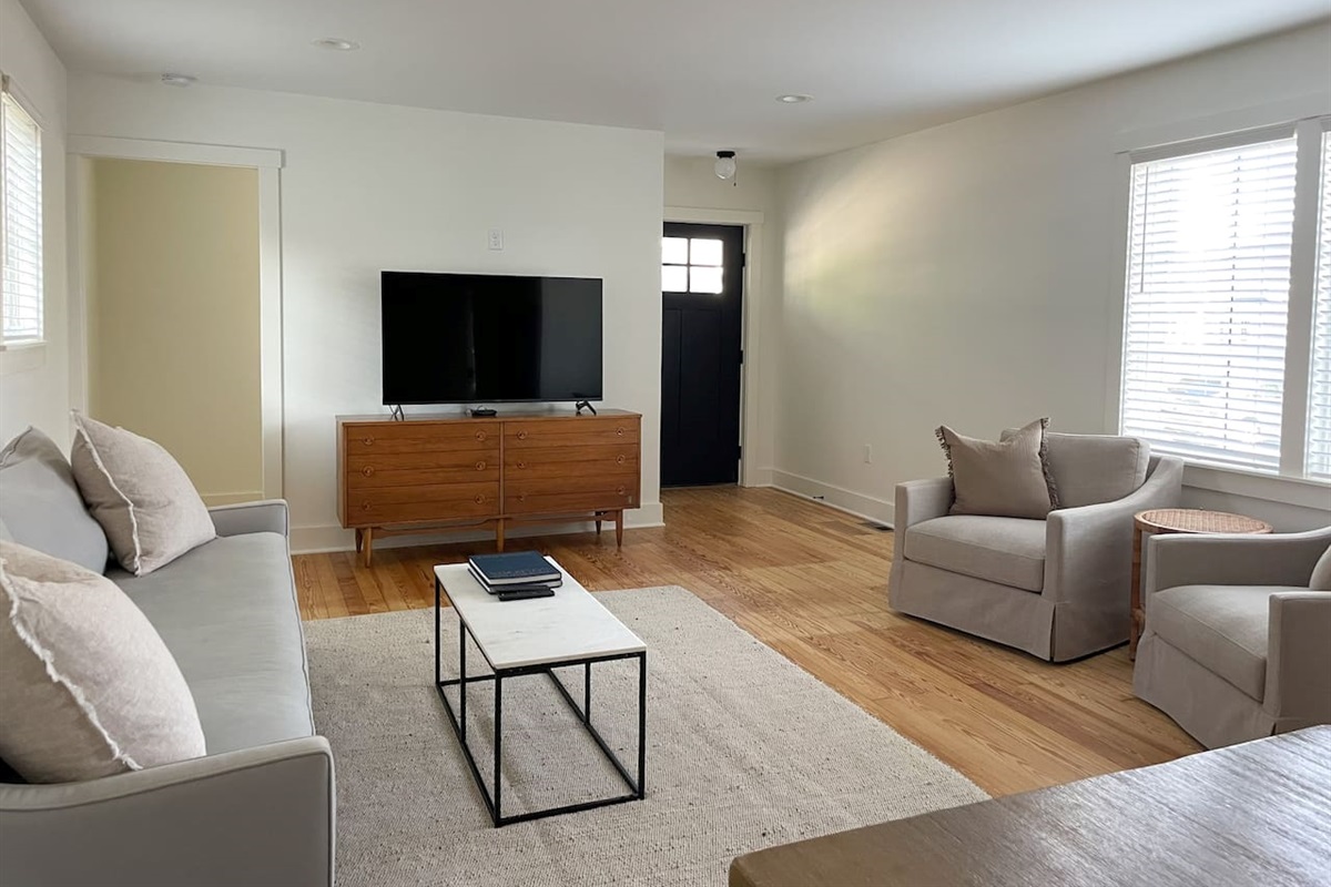 Cozy up in the inviting living room after a day by the water.