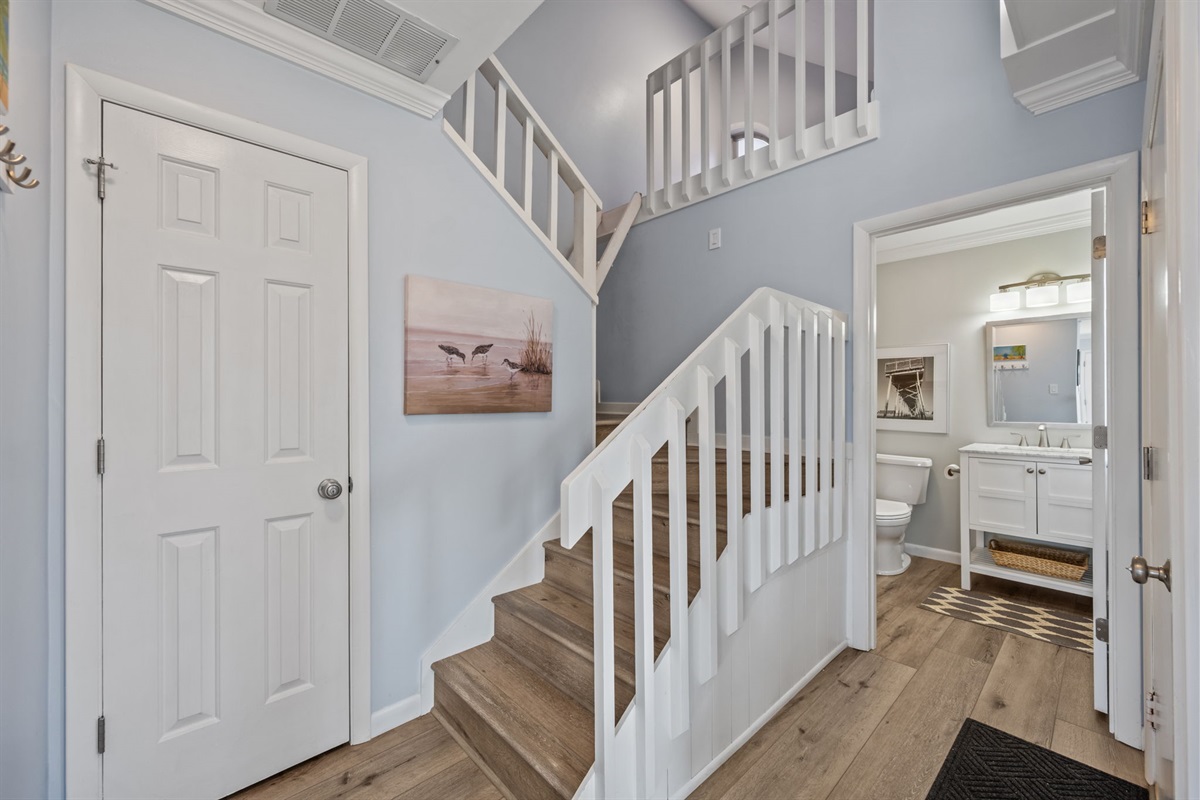 Head upstairs to unwind in spacious, bright, and inviting sleeping spaces for everyone in your group.