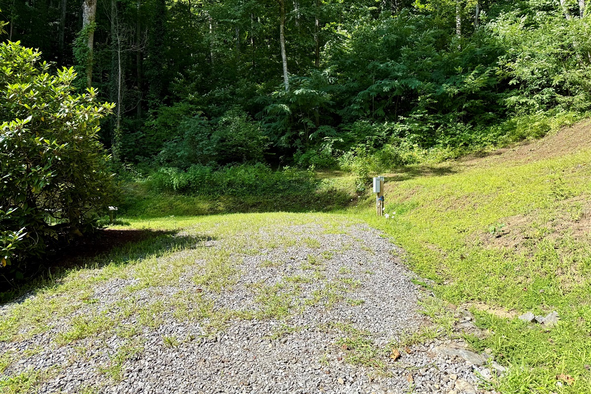All set for your next getaway — full hookups, picnic table, and peaceful mountain vibes at Site 3.