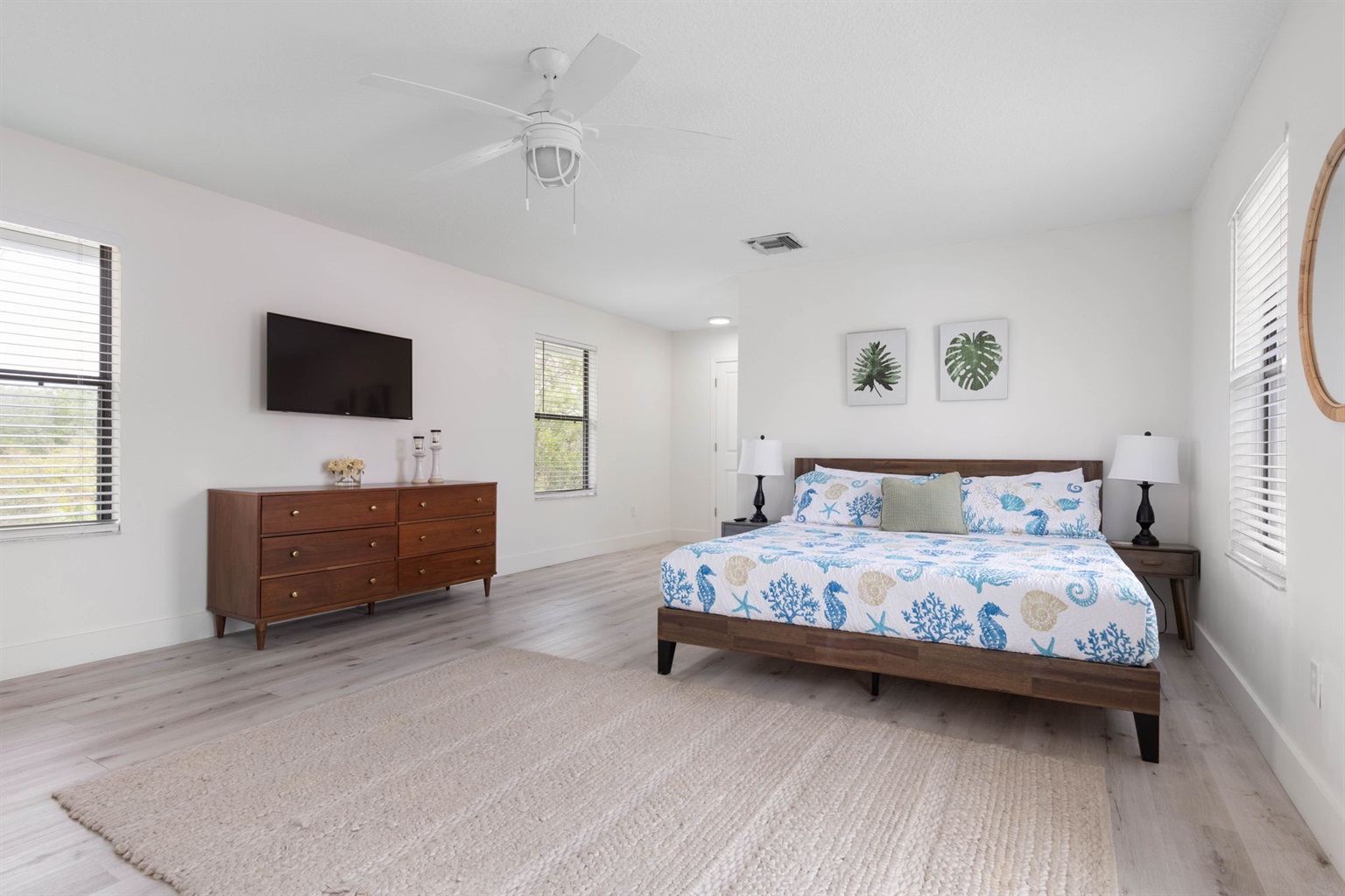 After sun-soaked beach days, this bright coastal bedroom welcomes everyone back to quiet comfort—little ones winding down, parents exhaling at last, and soft lamplight settling over the room as tomorrow’s memories begin with one more goodnight.