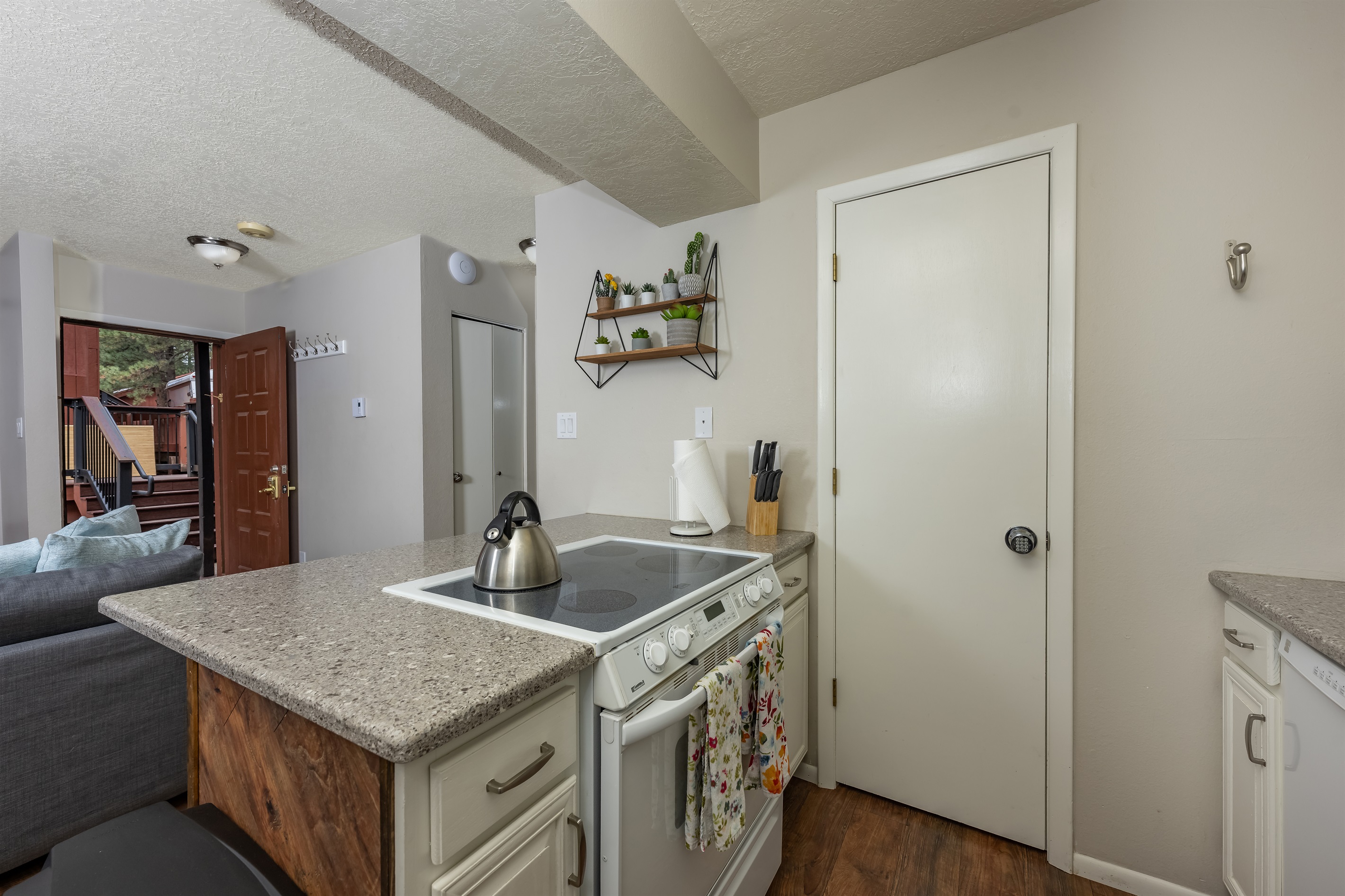 Kitchen view opening up to front entry.