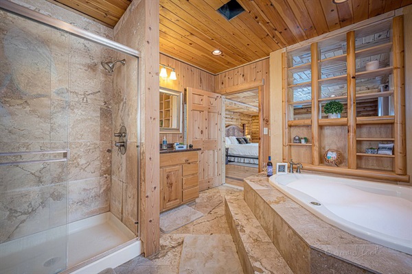 Primary bathroom with jet tub and shower.