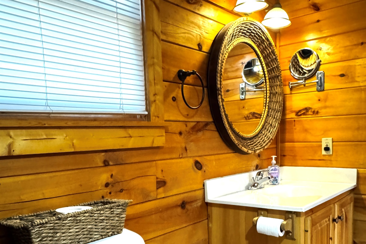 Downstairs bathroom with tub and shower
